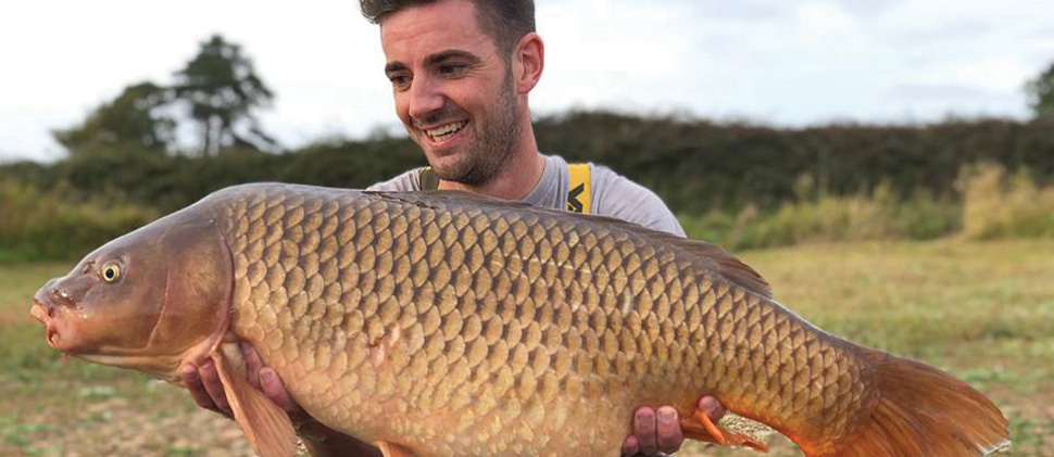 Angler holding a fish