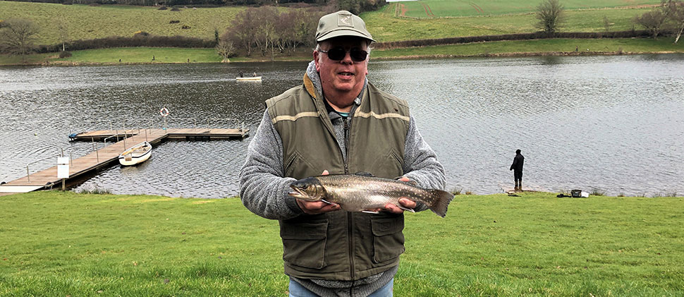 Angler holding a fish