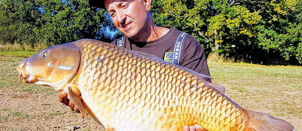 Angler holding a fish